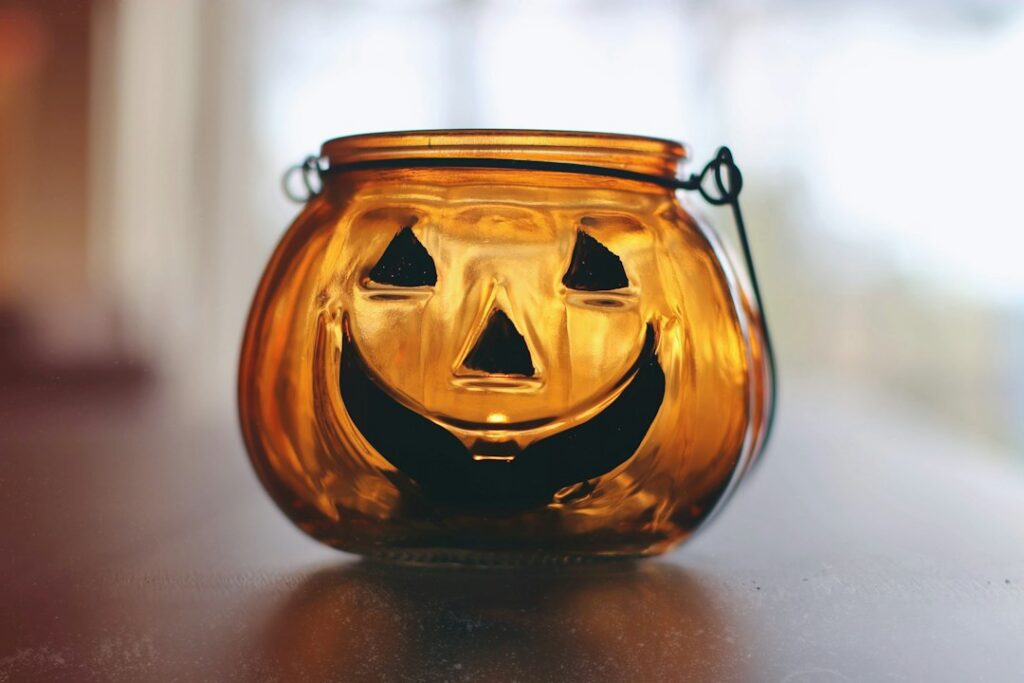 Decorated Halloween activity jar with daily project slips